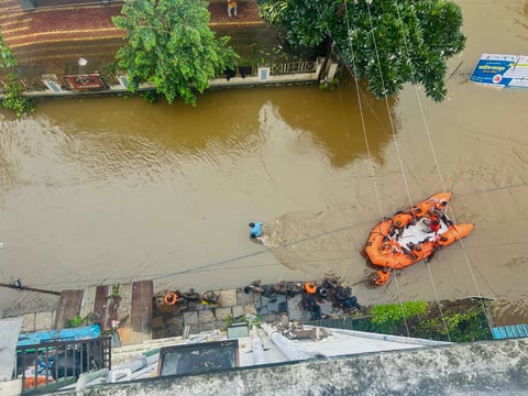 Indian Army and NDRF personnel during a rescue operation in a flood-affected area, in Pune's Ekta Nagar, Sunday, Aug. 4,